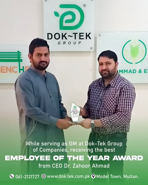 Celebrating Excellence: DOK-TEK Group Honors Mr. Faisal with the 'Employee of the Year' Award CEO Dr. Zahoor Ahmad presenting Employee of the Year award to GM Mr. Faisal at DOK-TEK Group.